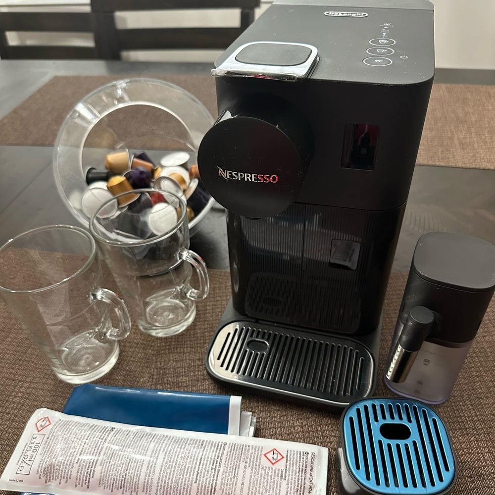 Nespresso Machine + coffee pods + coffee pod dispenser + nespresso coffee mugs